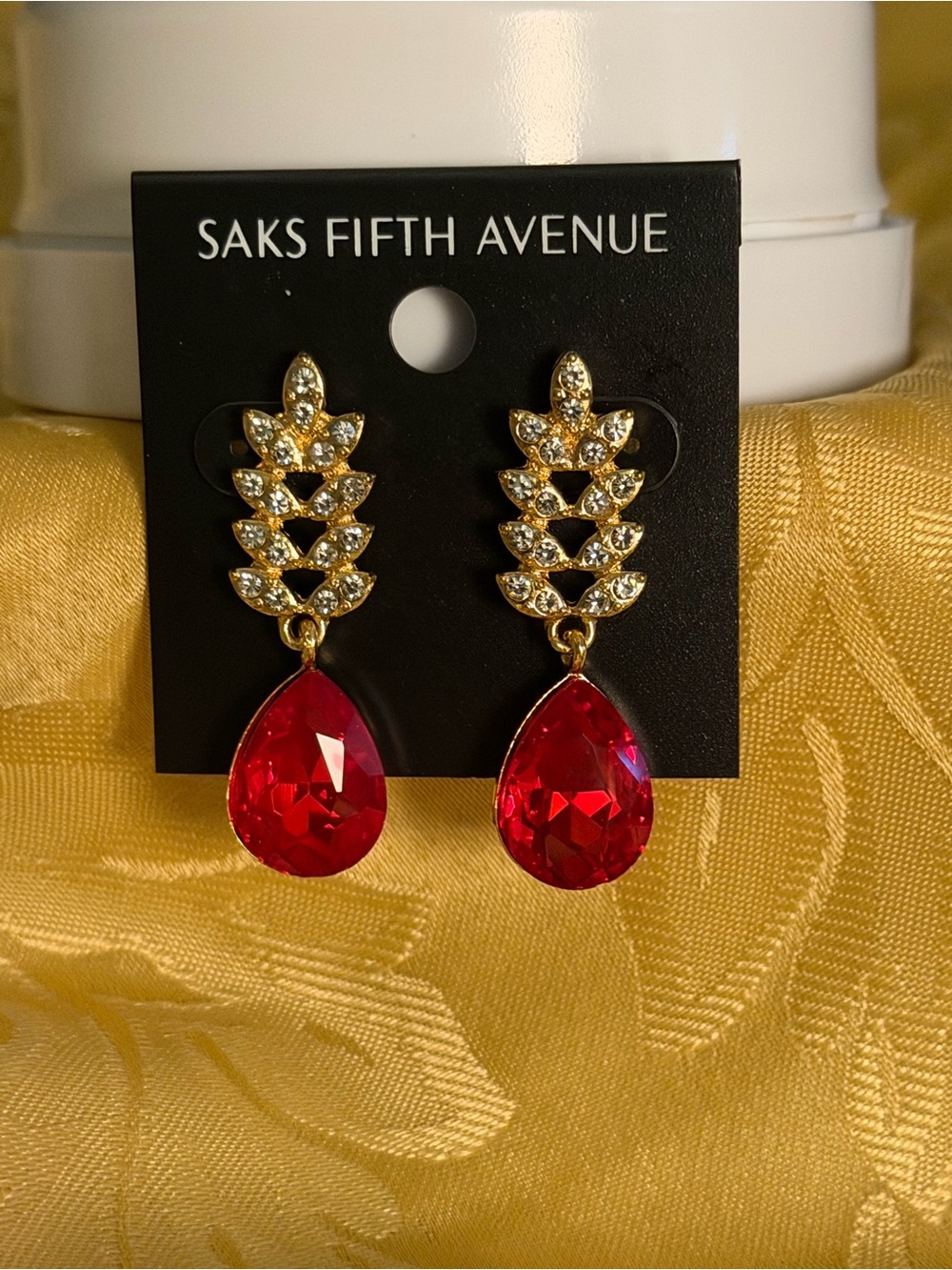 Saks Fifth Avenue Golden Earrings with Red Teardrop Crystals
